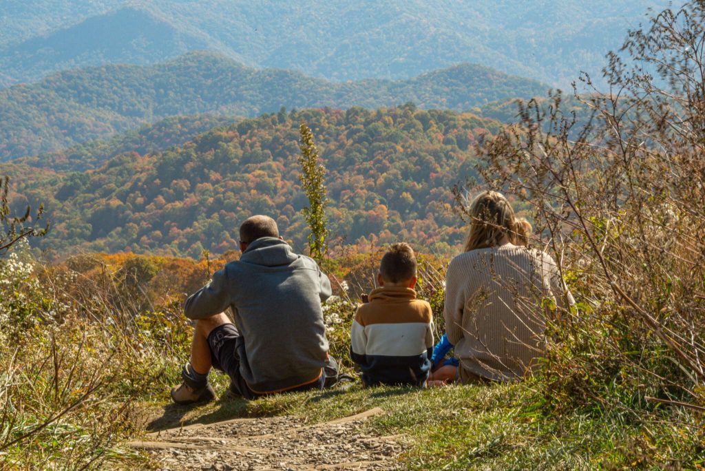 family enjoying fall color in nc smoky mountains